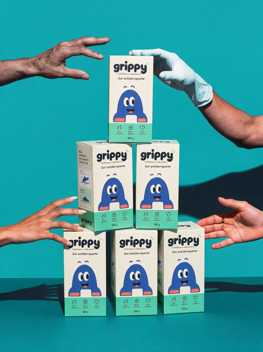 Concept image of stacked GRIPPY cartons against a teal background